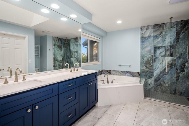 15214 102nd Ave NE, Bothell, WA 98011 - full bathroom with a garden tub, a marble finish shower, recessed lighting, double vanity, and tile patterned floors