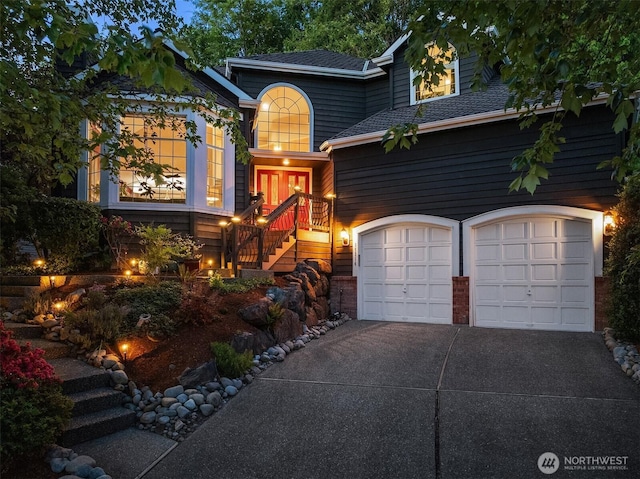 15214 102nd Ave NE, Bothell, WA 98011 - view of front of property featuring stairway, driveway, and roof with shingles