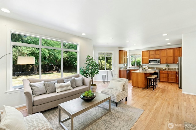 3303 174th Pl SE, Bothell, WA 98012 - living area featuring light wood-style flooring and recessed lighting