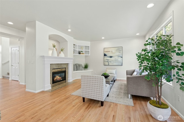 3303 174th Pl SE, Bothell, WA 98012 - living room with light wood finished floors, a fireplace, and recessed lighting