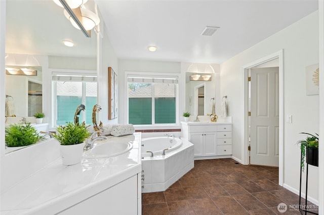 3303 174th Pl SE, Bothell, WA 98012 - full bathroom featuring two vanities and a garden tub