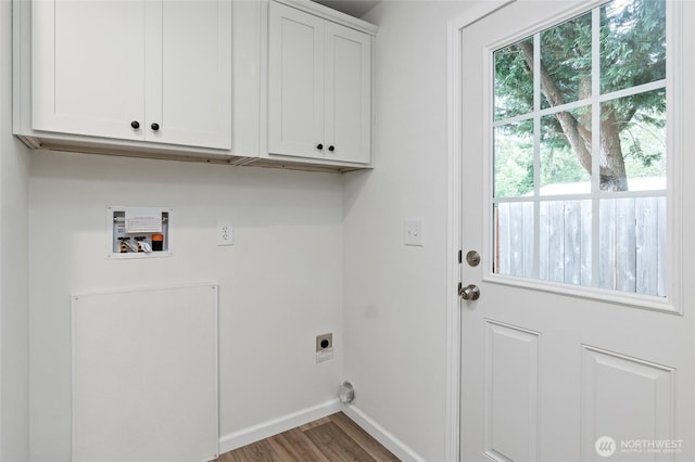 25405 36th Ave E, Spanaway, WA 98387 - laundry area featuring hookup for an electric dryer, cabinet space, washer hookup, and wood finished floors