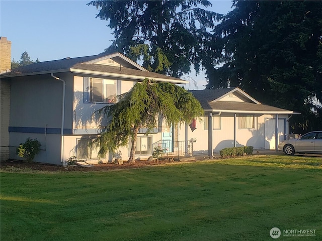 11072 Peacock Ln, Burlington, WA 98233 - view of front of house featuring a front yard, a chimney, and stucco siding