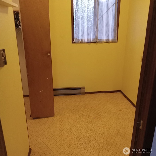 11072 Peacock Ln, Burlington, WA 98233 - spare room featuring a baseboard radiator