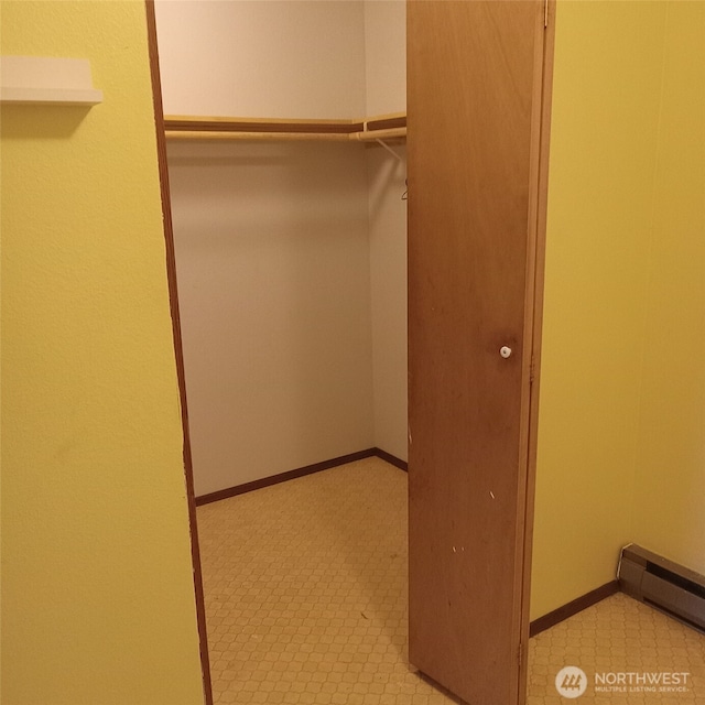11072 Peacock Ln, Burlington, WA 98233 - walk in closet featuring baseboard heating