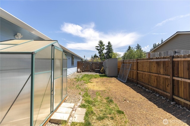 6321 199th Loop SW, Rochester, WA 98579 - fenced backyard with an exterior structure and a shed