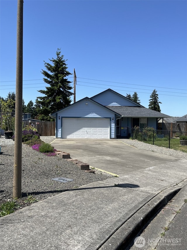 6321 199th Loop SW, Rochester, WA 98579 - ranch-style home with concrete driveway and a garage