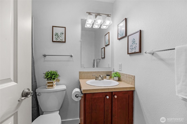 23405 16th Pl S Unit C104, Des Moines, WA 98198 - bathroom featuring vanity and tasteful backsplash