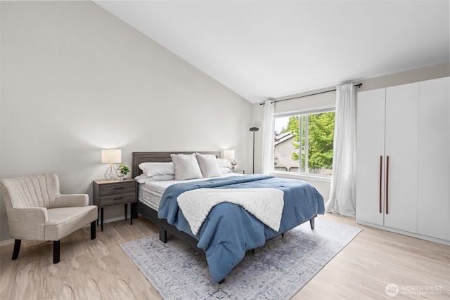 1131 115th St SW Unit E4, Everett, WA 98204 - bedroom featuring light wood-type flooring and high vaulted ceiling