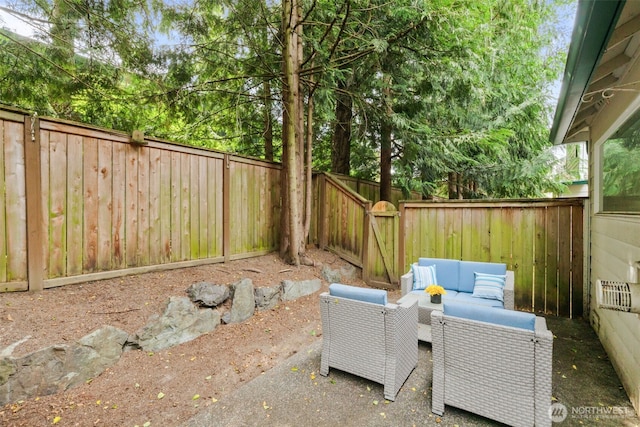 1131 115th St SW Unit E4, Everett, WA 98204 - fenced backyard with an outdoor living space and a patio