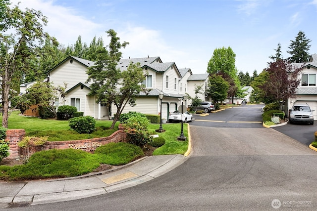 1131 115th St SW Unit E4, Everett, WA 98204 - view of asphalt road featuring a residential view and curbs
