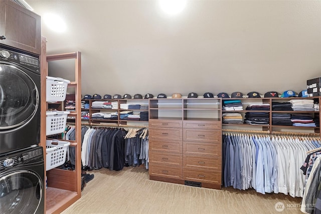 16060 Telemark Ln, Leavenworth, WA 98826 - spacious closet featuring stacked washer / dryer and light carpet