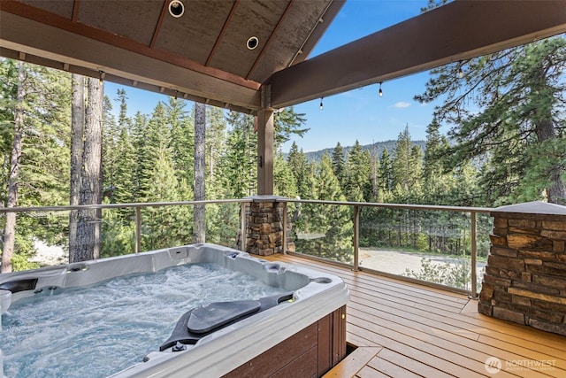16060 Telemark Ln, Leavenworth, WA 98826 - wooden terrace featuring a hot tub and a view of trees