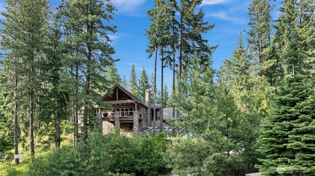 16060 Telemark Ln, Leavenworth, WA 98826 - view of side of property with a view of trees and a chimney