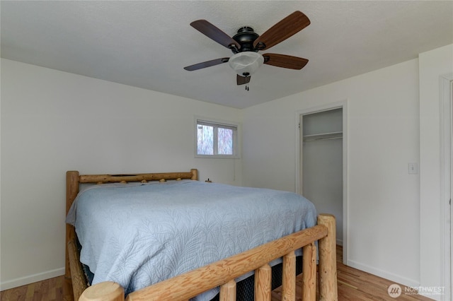 4637 N Visscher St, Tacoma, WA 98407 - bedroom with wood finished floors, ceiling fan, and a closet