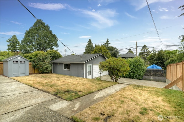 4637 N Visscher St, Tacoma, WA 98407 - view of yard with an outdoor structure and a garage