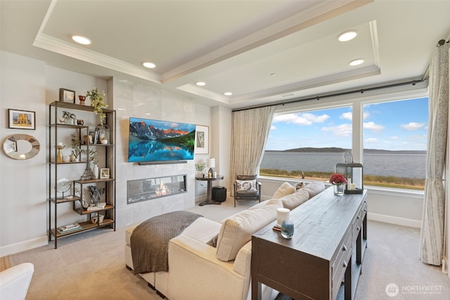 4907 Main St Unit 207, Tacoma, WA 98407 - living room with a tray ceiling, light carpet, ornamental molding, recessed lighting, and a high end fireplace