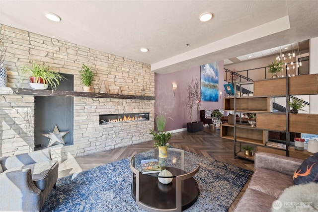 4961 Main St Unit 719, Tacoma, WA 98407 - living area featuring a fireplace and recessed lighting