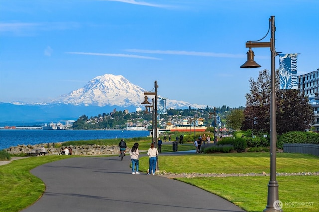 4961 Main St Unit 719, Tacoma, WA 98407 - view of community featuring a yard and a water and mountain view