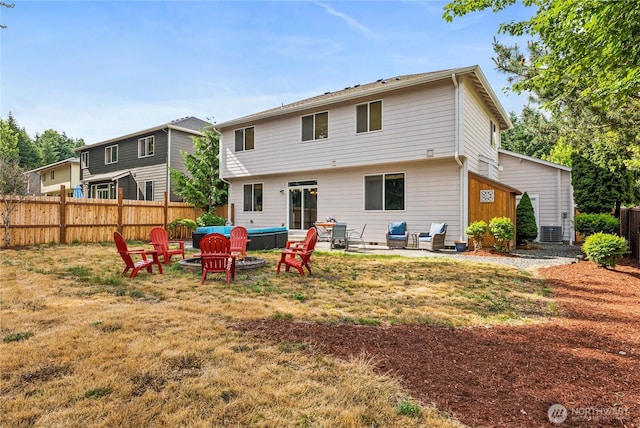 20523 193rd Avenue Ct E, Orting, WA 98360 - back of property featuring an outdoor hangout area and a patio area