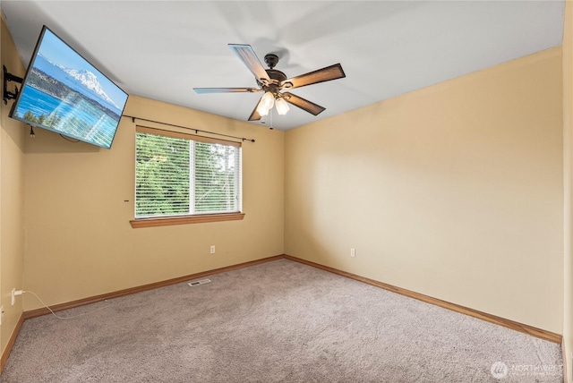 20523 193rd Avenue Ct E, Orting, WA 98360 - carpeted spare room with baseboards and a ceiling fan
