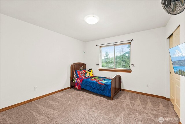 20523 193rd Avenue Ct E, Orting, WA 98360 - carpeted bedroom featuring baseboards