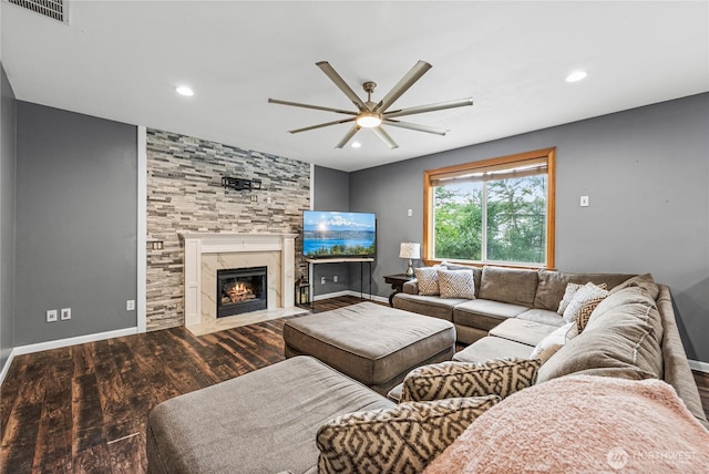 20523 193rd Avenue Ct E, Orting, WA 98360 - living room with wood finished floors, a ceiling fan, a fireplace, and recessed lighting