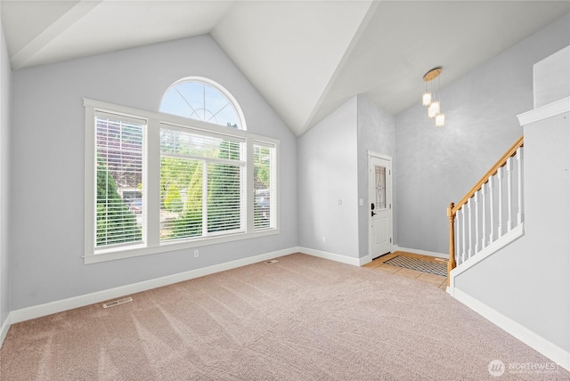 20523 193rd Avenue Ct E, Orting, WA 98360 - carpeted foyer featuring stairs and lofted ceiling