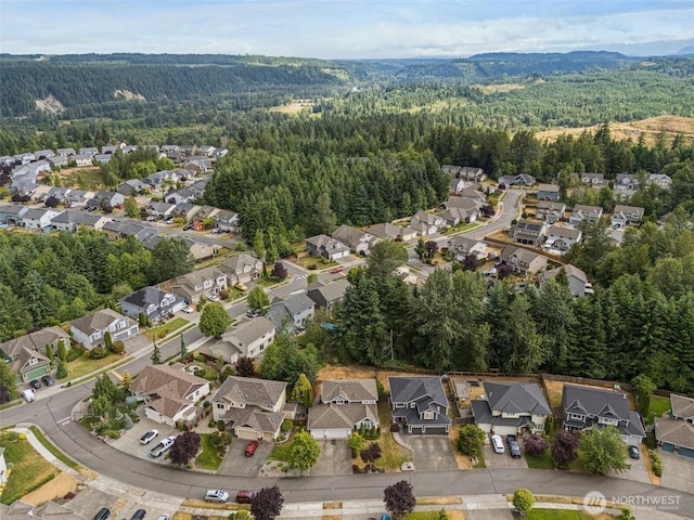 20523 193rd Avenue Ct E, Orting, WA 98360 - aerial view of property's location featuring a heavily wooded area and nearby suburban area