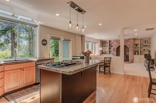 18915 SE 284th Ct, Kent, WA 98042 - kitchen featuring gas stovetop, dishwasher, light wood-type flooring, recessed lighting, and light brown cabinets