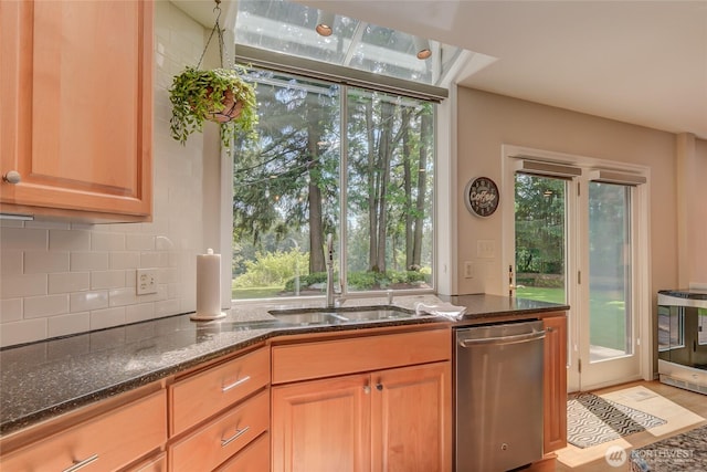 18915 SE 284th Ct, Kent, WA 98042 - kitchen with stainless steel dishwasher, dark stone counters, tasteful backsplash, beverage cooler, and light wood finished floors