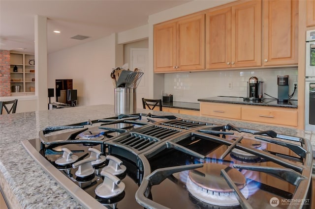 18915 SE 284th Ct, Kent, WA 98042 - kitchen view of black gas stovetop, backsplash, light brown cabinets, recessed lighting, and stainless steel oven