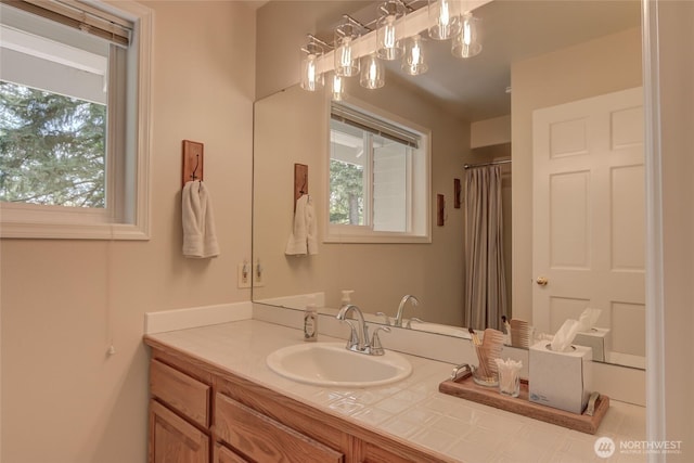 18915 SE 284th Ct, Kent, WA 98042 - full bath with vanity, healthy amount of natural light, and a shower with shower curtain