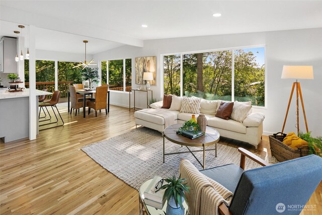 12569 37th Ave NE, Seattle, WA 98125 - living room with light wood-style flooring and recessed lighting