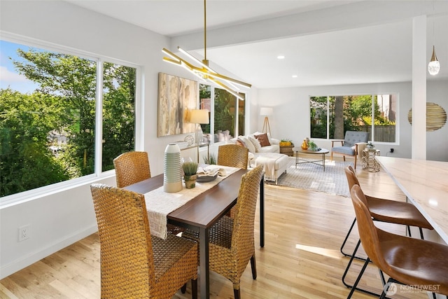 12569 37th Ave NE, Seattle, WA 98125 - dining area featuring light wood finished floors and recessed lighting
