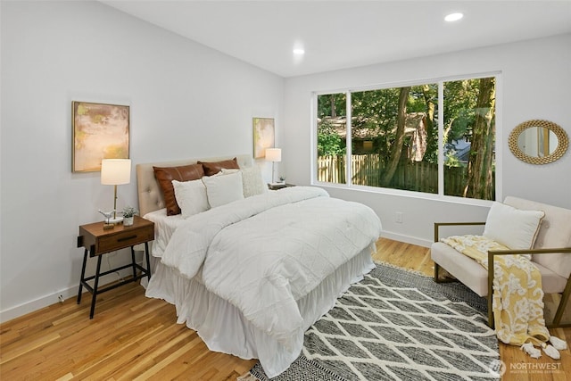 12569 37th Ave NE, Seattle, WA 98125 - bedroom with wood finished floors and recessed lighting