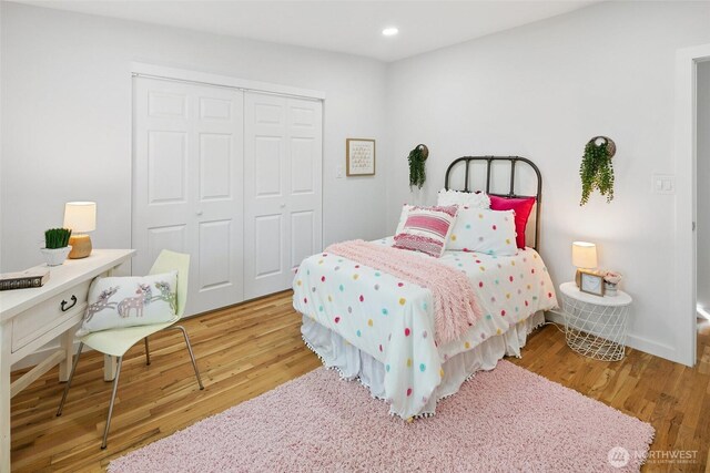 12569 37th Ave NE, Seattle, WA 98125 - bedroom featuring a closet, wood finished floors, and recessed lighting