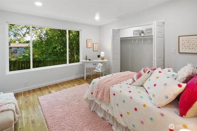 12569 37th Ave NE, Seattle, WA 98125 - bedroom featuring a closet, recessed lighting, and wood finished floors