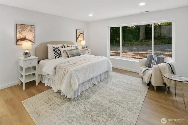 12569 37th Ave NE, Seattle, WA 98125 - bedroom with light wood-style floors and recessed lighting
