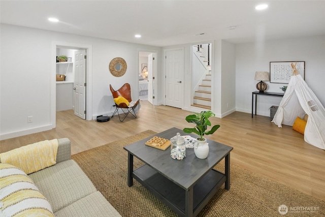 12569 37th Ave NE, Seattle, WA 98125 - living area with stairway, light wood-style floors, and recessed lighting