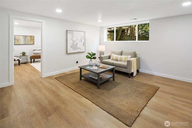 12569 37th Ave NE, Seattle, WA 98125 - living room with light wood-style flooring and recessed lighting