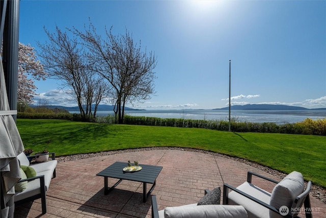 3851 Cliffside Dr, Bellingham, WA 98225 - view of patio featuring a water and mountain view