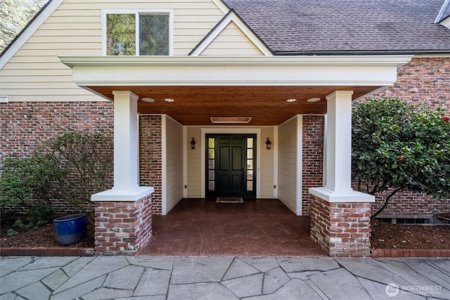 3851 Cliffside Dr, Bellingham, WA 98225 - property entrance with brick siding and a shingled roof