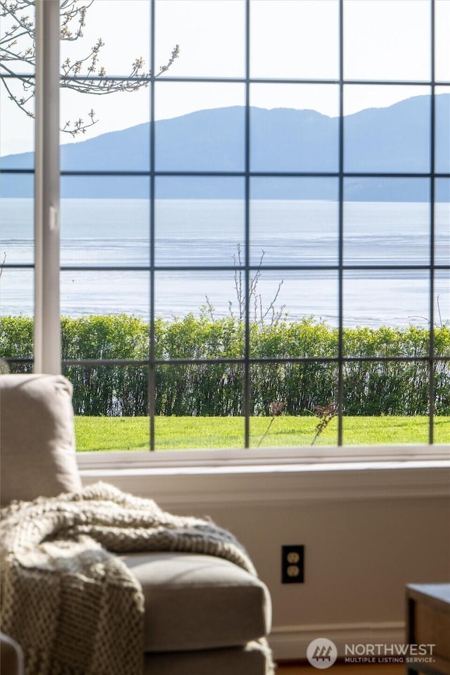 3851 Cliffside Dr, Bellingham, WA 98225 - living area with a water and mountain view and plenty of natural light