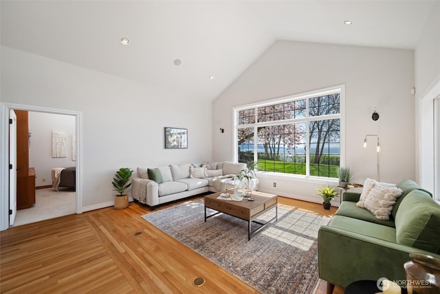 3851 Cliffside Dr, Bellingham, WA 98225 - living area featuring light wood-style flooring, high vaulted ceiling, and recessed lighting