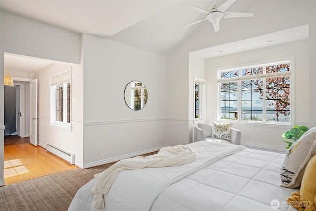 3851 Cliffside Dr, Bellingham, WA 98225 - bedroom with a baseboard heating unit, lofted ceiling, and a ceiling fan