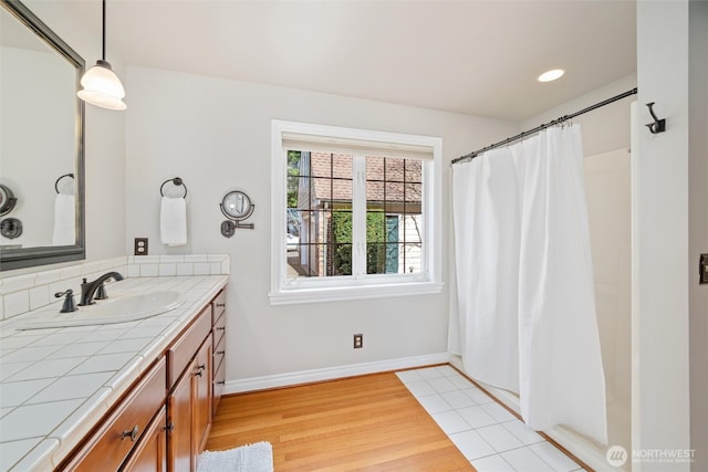3851 Cliffside Dr, Bellingham, WA 98225 - bathroom featuring vanity, wood finished floors, recessed lighting, and curtained shower