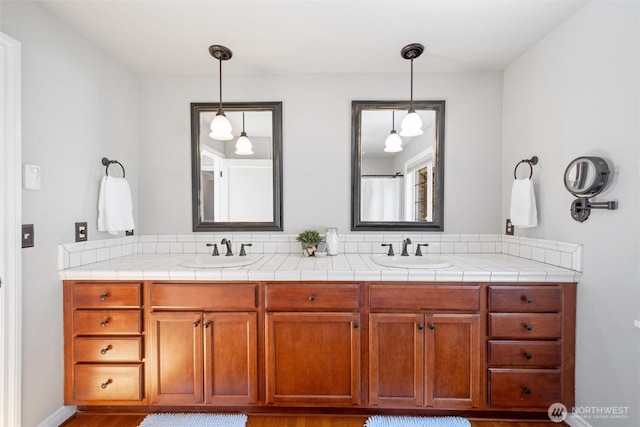 3851 Cliffside Dr, Bellingham, WA 98225 - full bathroom with double vanity and wood finished floors