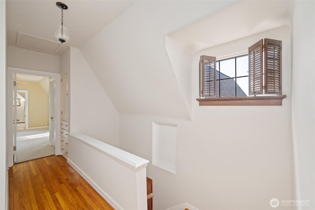 3851 Cliffside Dr, Bellingham, WA 98225 - hallway with wood finished floors, lofted ceiling, and attic access