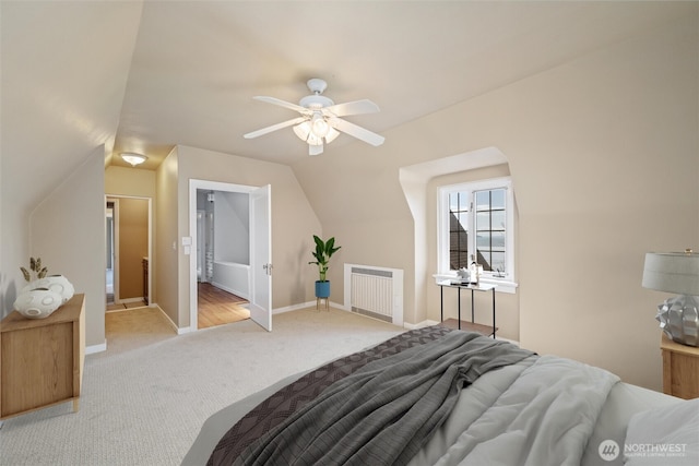 3851 Cliffside Dr, Bellingham, WA 98225 - carpeted bedroom featuring radiator, vaulted ceiling, and a ceiling fan